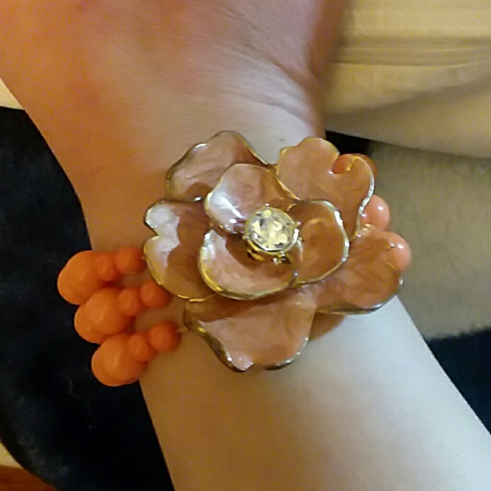 Three band orange beaded bracelet with rose